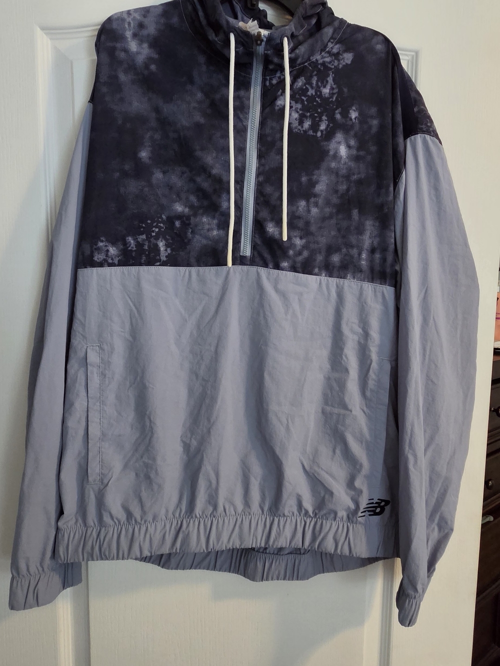 New Balance Men's Two-Tone Pullover Windbreaker in Black and Light Gray